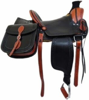 Black and brown horse saddle with attached bags