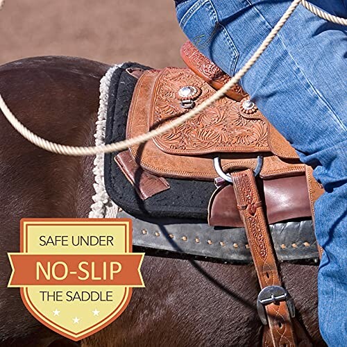 Close-up of a non-slip horse saddle with rider.